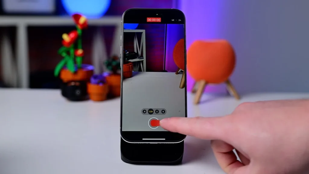 Dragging the shutter to the right locks it into video mode using QuickTake.